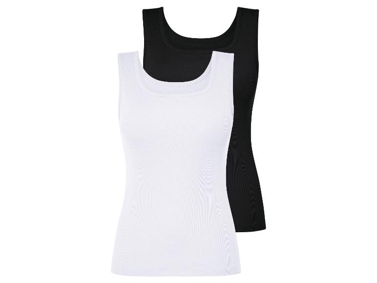 Twee witte en zwarte tanktops.