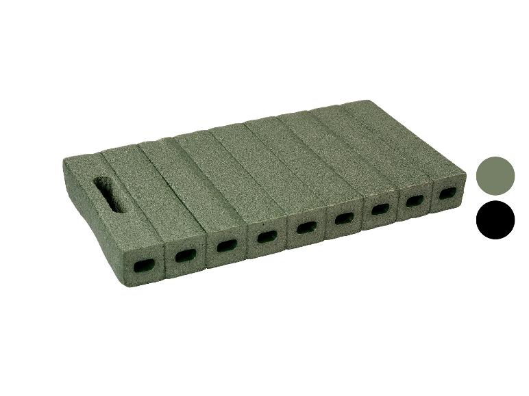 Groen tuinkniekussen met handvat en holle secties.