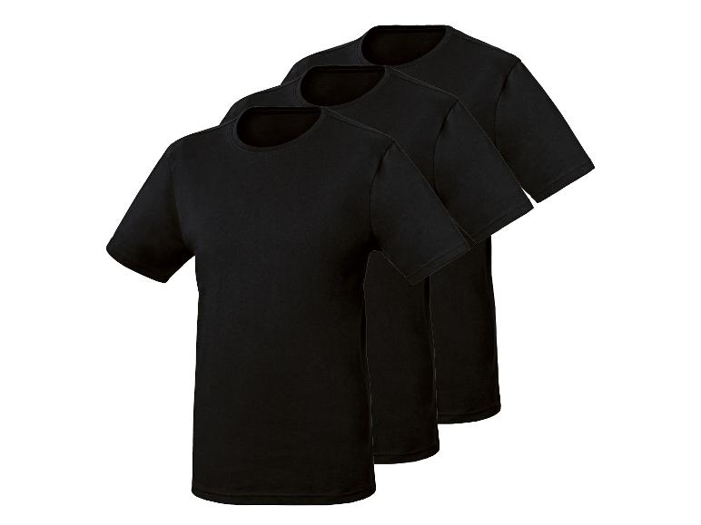 Drie zwarte T-shirts met korte mouwen, diagonaal gerangschikt