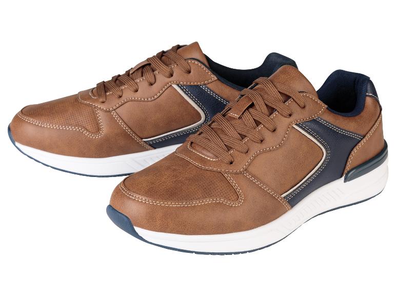 Bruine sportschoenen voor heren met blauwe details.