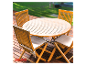 Teakhouten tuinset met tafel en stoelen.