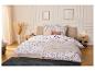 LIVARNO home microvezel-jersey hoeslaken op een elegant opgemaakt bed.