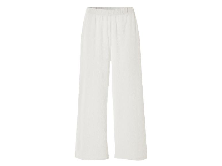 Wijde witte broek, elegante stijl.