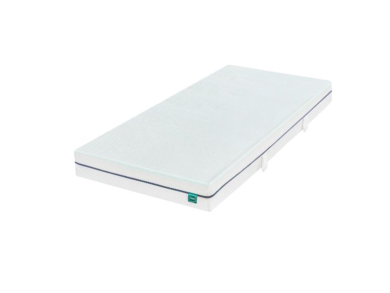 Wit matras met blauwe bies en groen label