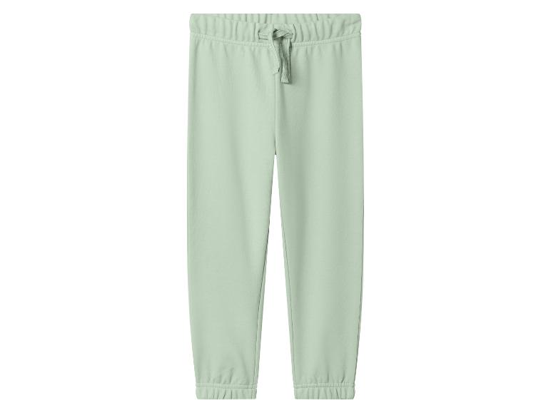 Lichtgroene joggingbroek met trekkoord in de taille.