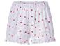 Witte pyjamashort met roze en rode hartjespatroon.