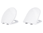Twee witte LIVARNO® Duroplast toiletzittingen in O- en D-vorm.