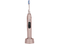 Elektrische sonische tandenborstel in roségoud op de oplaadhouder
