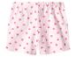 Lichtroze short met een all-over patroon van kleine roze hartjes.