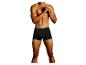 Shirtloze man in zwarte Reebok boxershort