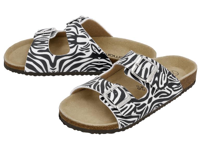 Dames sandalen met twee zebraprint bandjes, met gespen.