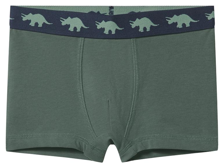 Groene jongensboxershorts met een donkerblauwe tailleband met lichtgroene dinosauruspatronen