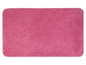 Een roze badmat van pluche.