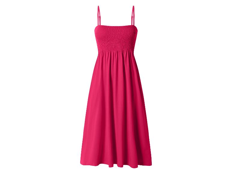 Roze jurk met spaghettibandjes en gesmokt lijfje.