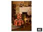 Oranje Halloween-deken met pompoenmotief gedrapeerd over een groene fauteuil. [AI-gegenereerde afbeelding]