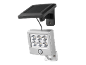 Zilveren LED-zonnelamp met bewegingssensor en zonnepaneel.