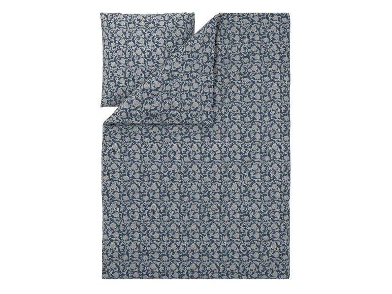 Dekbedovertrek en kussensloop set met blauw en grijs bloemenpatroon.