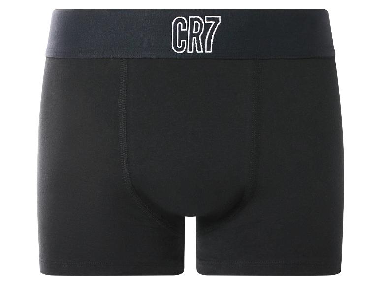 Zwarte boxershort met een wit logo op de tailleband.