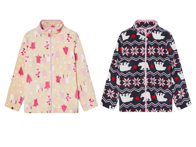 Twee kinderfleecejacks met een kerstprint: een met kerstboommotieven, de andere met ijsberen.