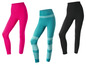 Drie paar leggings in roze, turquoise en zwart.