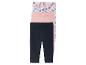 Drie leggings voor kinderen: één met schelpjesprint, één roze en één donkerblauw.