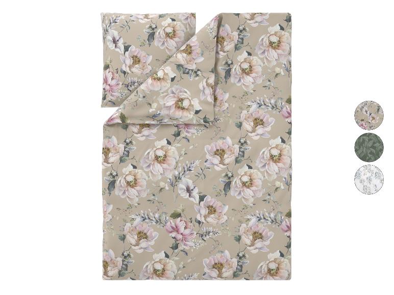 Bloemrijk dekbedovertrekset met grote lichtroze en witte bloemen op een beige achtergrond.