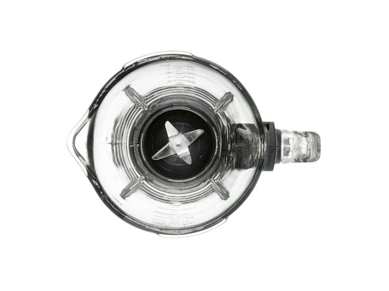 Bovenaanzicht van een glazen blenderkan.