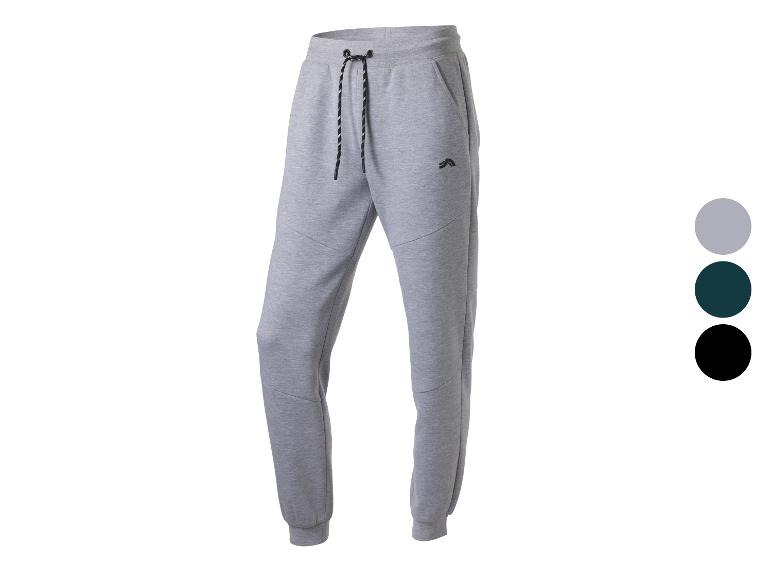 Grijze joggingbroek met trekkoord en zakken, met kleuropties ernaast.