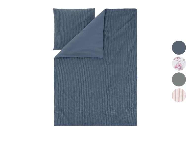 Blauw gestreept dekbedovertrek en kussensloop set, met kleur- en patroonstalen.