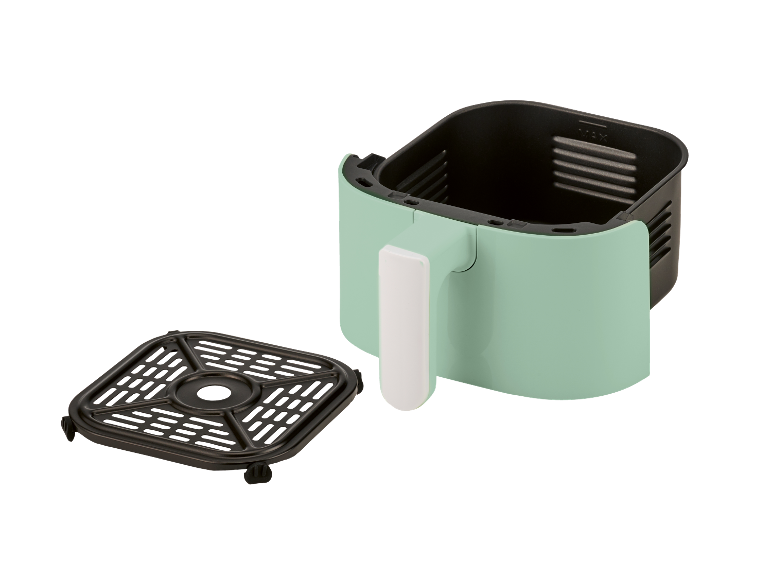 Mintgroene airfryer met mand en rooster.