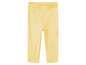 Gele ribgebreide leggings voor baby's.