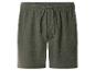 Donkergroene herenshorts van gekreukelde katoen met elastische tailleband en trekkoord.