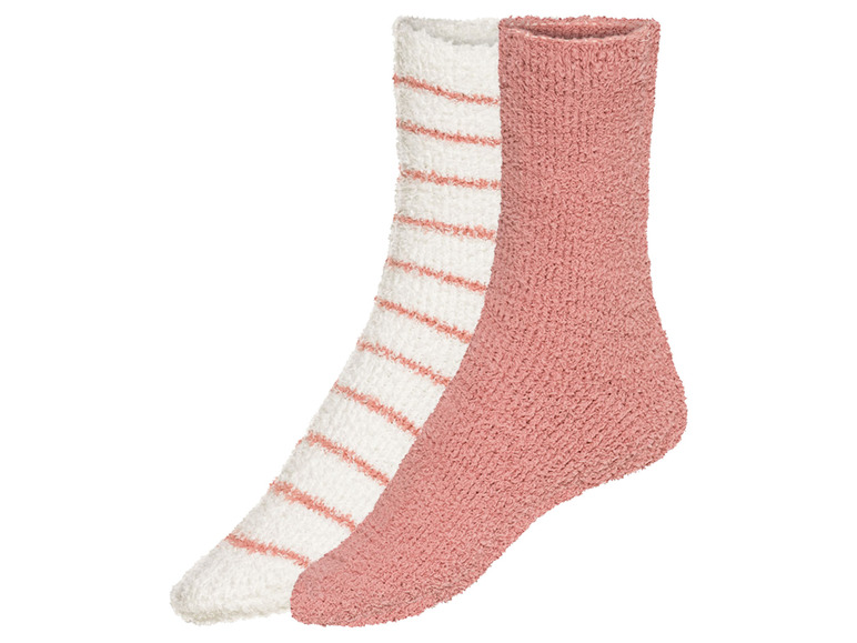 Twee paar zachte sokken, een met roze strepen en een effen roze.