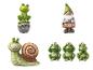 Tuinbeeldjes met kikkers, een slak en een dwerg met een 'Welkom' bord.