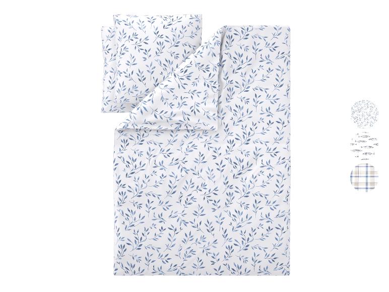 Wit dekbedovertrekset met blauw bladpatroon, met drie stofstalen.