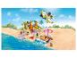 Lego Friends strandscène met vliegtuig, strandbar en figuren.