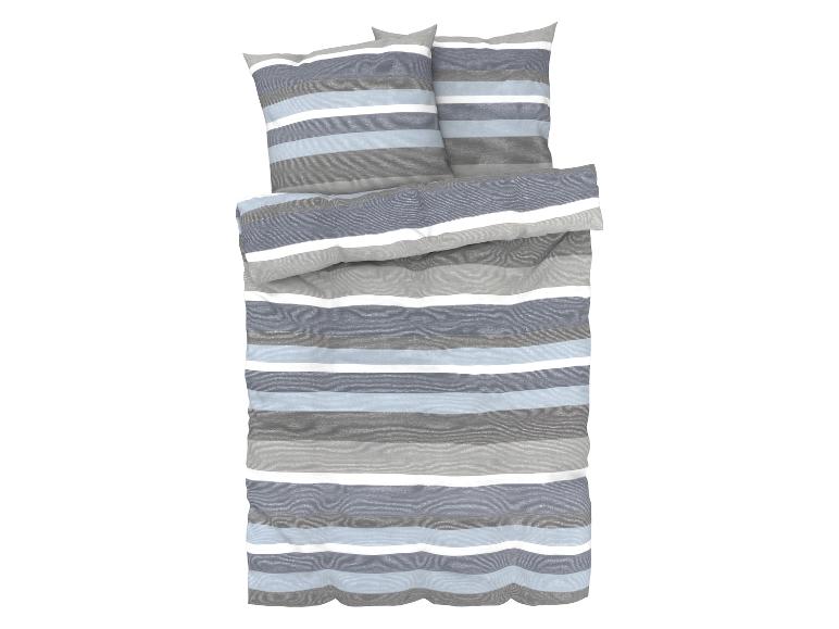 Beddengoedset met gestreept patroon in grijs en blauw.