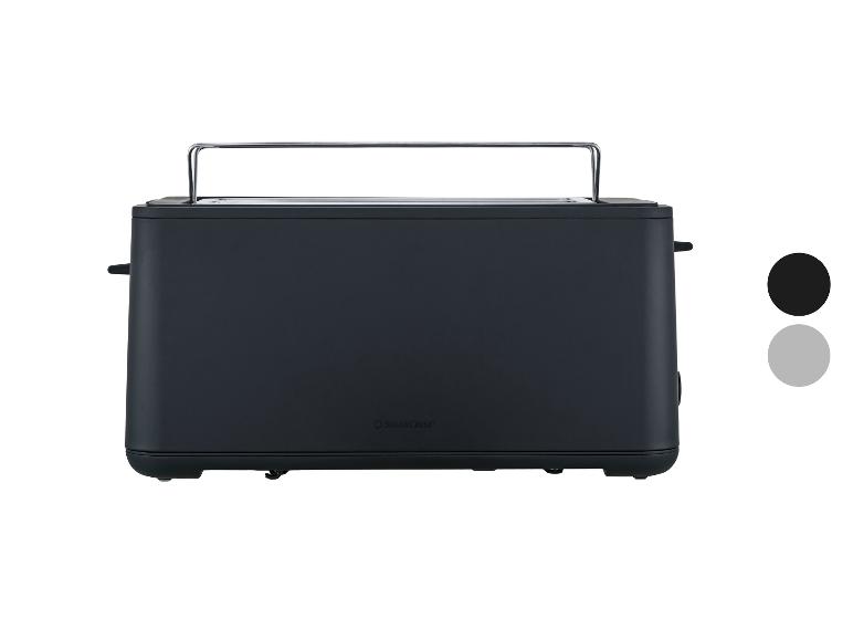 Zwarte broodrooster met een chromen broodjesrek en twee kleurstalen.