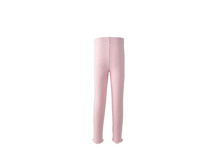 Lichtroze geribbelde baby legging met golvende zomen.