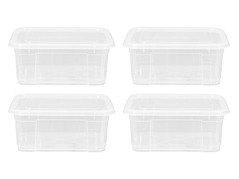 Vier doorzichtige rechthoekige plastic opbergdozen met deksels, gerangschikt in twee rijen.