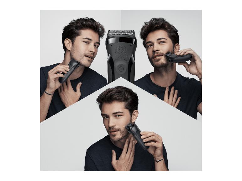 Een man scheert zich met een elektrisch scheerapparaat.