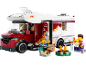 Speelgoedcamper met poppetjes, kampvuur en accessoires.