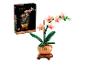 Miniatuur orchideeplant van bouwstenen met de productdoos.