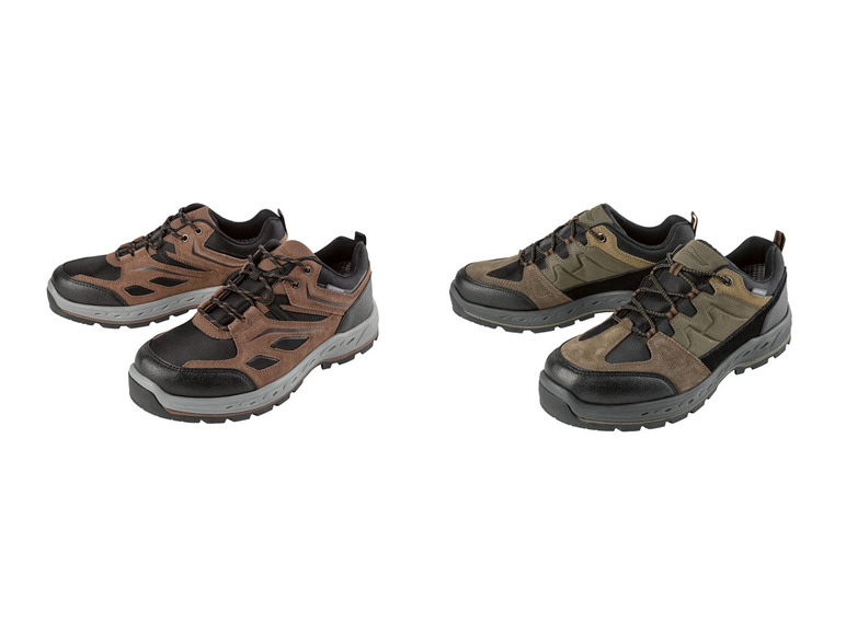 Twee paar bruine en groene wandelschoenen.