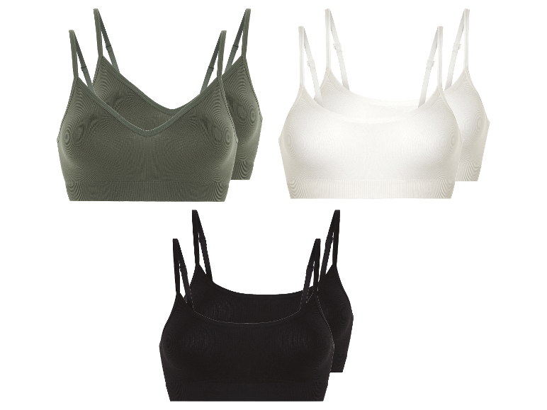 Drie sets sportbeha's met dunne bandjes in olijfgroen, wit en zwart.