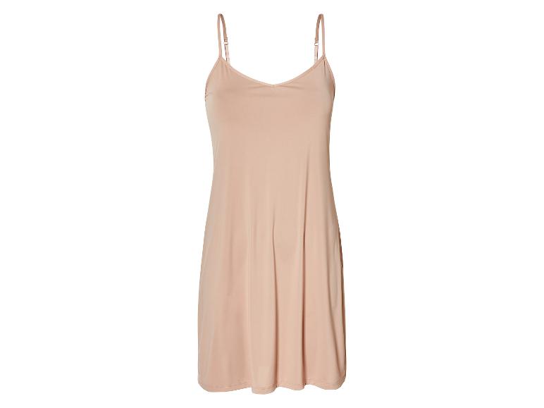Een beige, spaghettibandjes slipdress van zachte stof.