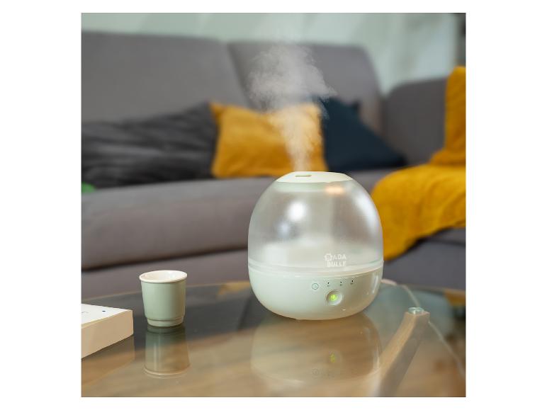 Luchtbevochtiger Bada Bulle op een glazen tafel.