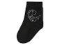 Zwarte sok met een dinosaurusprint.