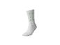 Witte sok met groene letters D E F, K L M, R S T en X Y Z