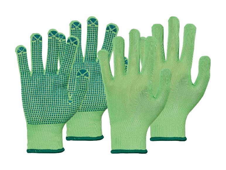 Groene werkhandschoenen met antislip stippen aan één zijde.